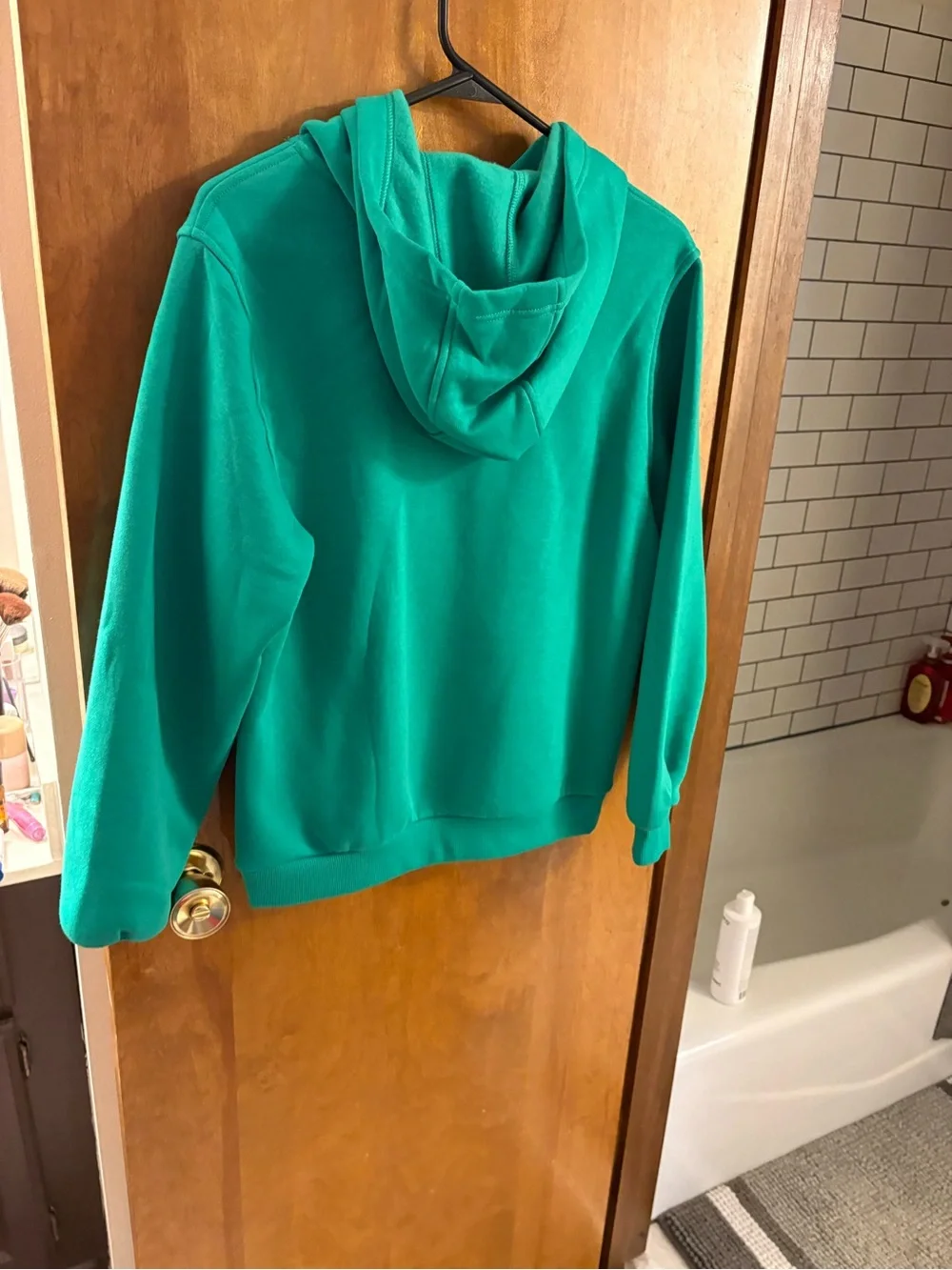 Nike Kid’s Teal Hoodie with White Logo